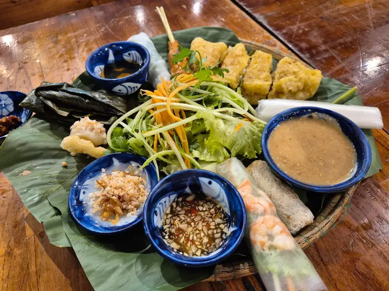 Banh beo Hue tasting platter with classic local dishesHue’s royal culinary tradition best places to eat hue