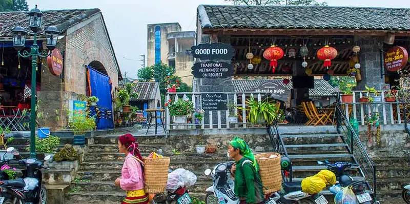 Ethnic minority vendors in mountain town How Many Days for the Ha Giang Loop? 6 day itineraries