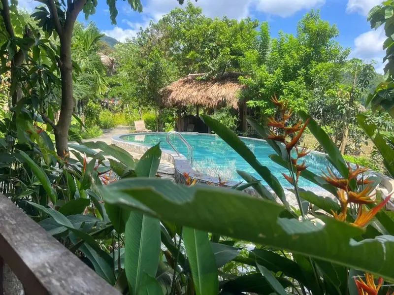 Relaxing poolside corner at Little Homestay homestay in mai chau